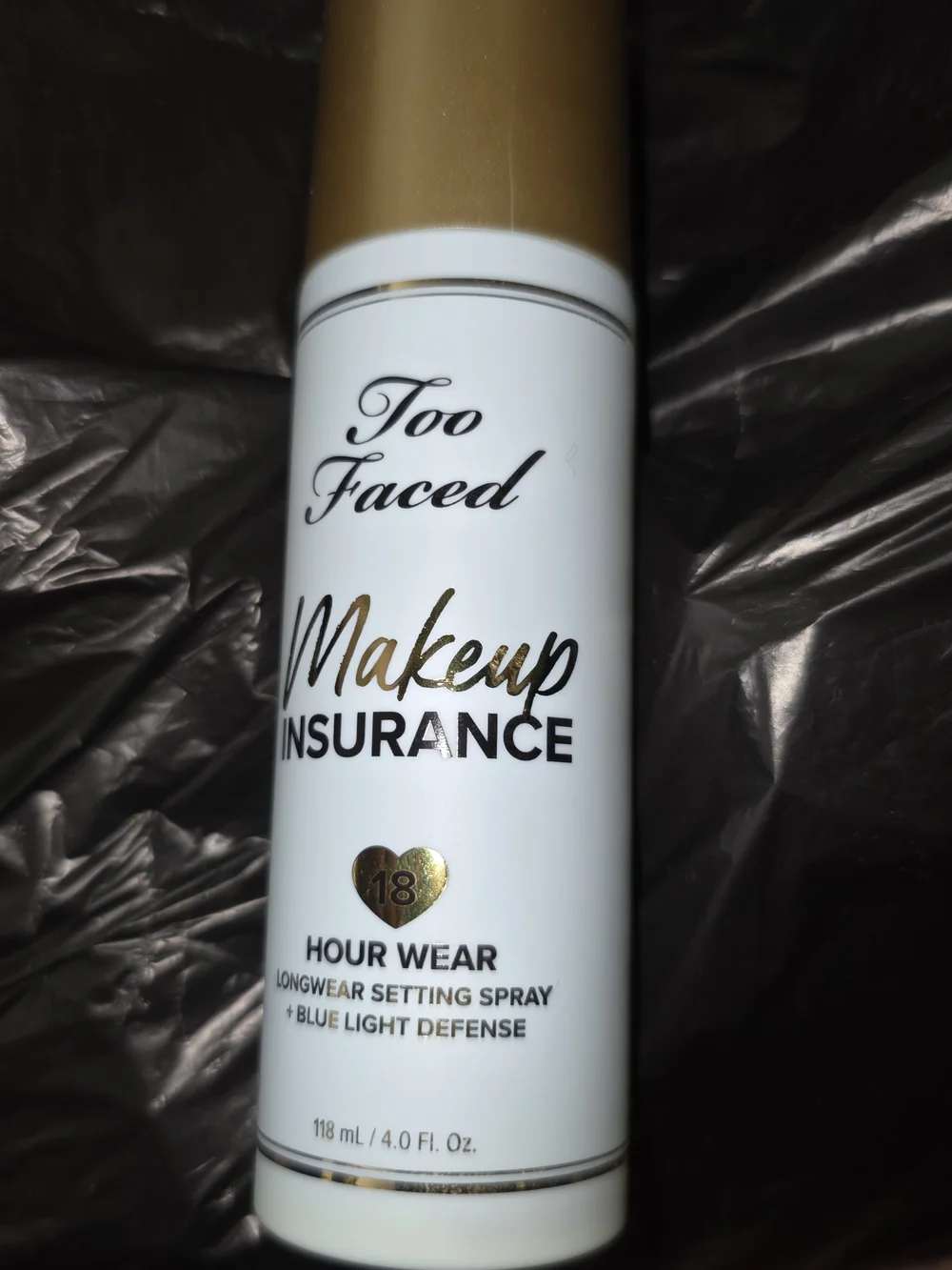 Too Faced Makeup Insurance Setting Spray — White & Gold